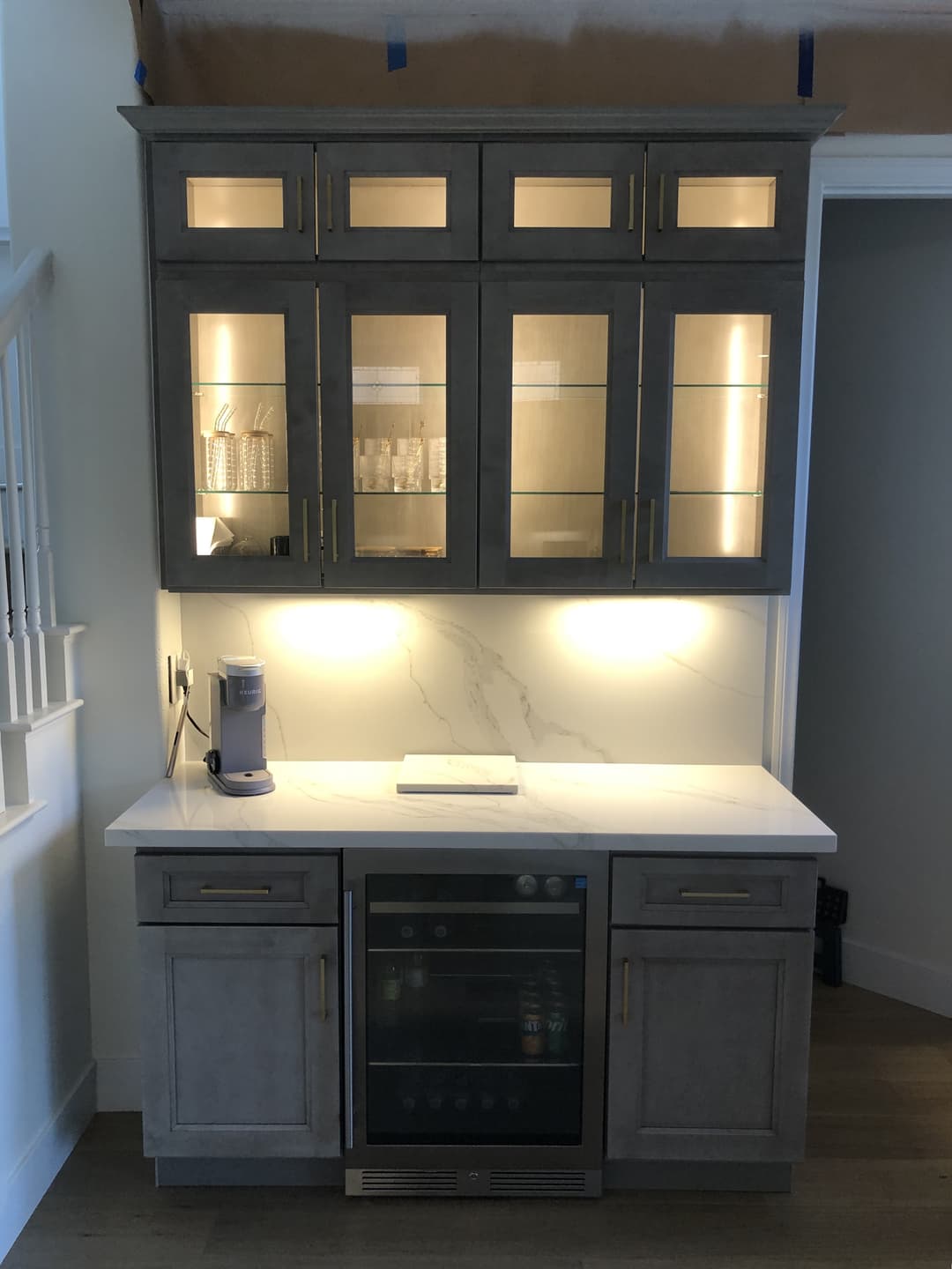 new kitchen bar with luxury cabinets and granite countertop